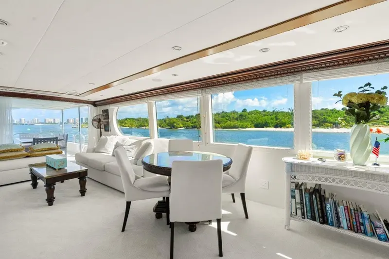 Envision's panoramic salon with bright seating and waterfront views